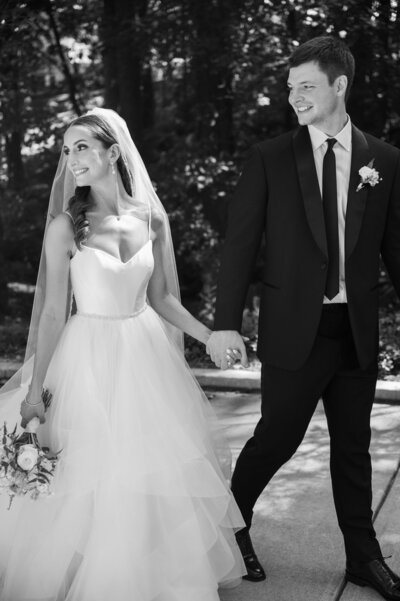 Bride and groom walk up memorial steps at their DC wedding