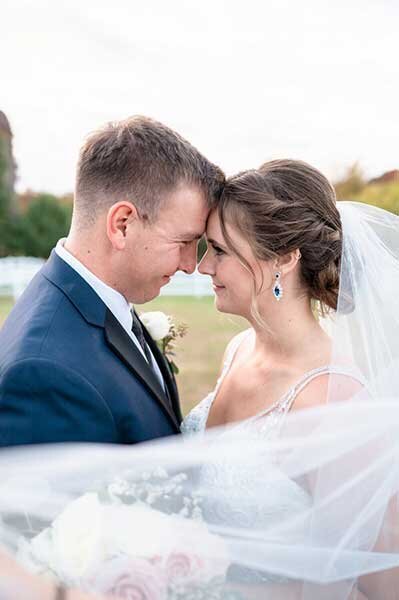 Editorial style wedding photo of bride and groom