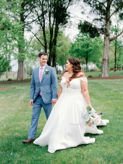 Bride and groom walk down the aisle after they get married