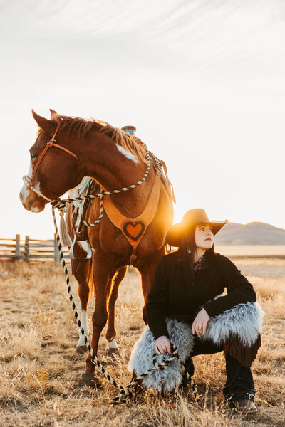 Montana cowgirl at sunset