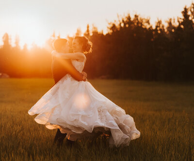 couple dancing beneath the glowing sunset