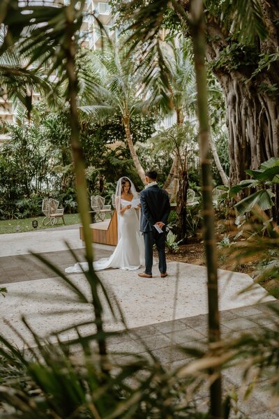 bride and groom exchange vows