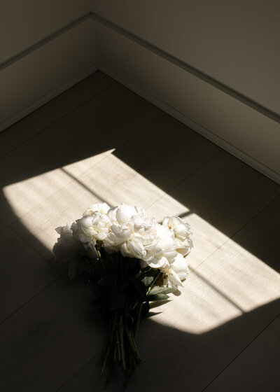 Bouquet of flowers laying on the floor