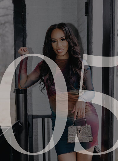 Woman in a red dress sitting on a teal couch with the number 02 overlaid on top