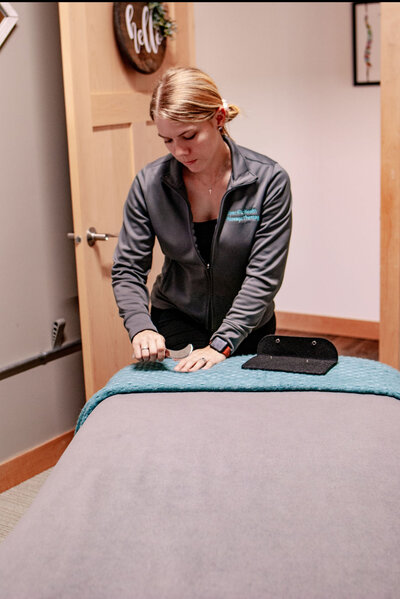 Owner Kayla Stroud-DuSavage performing massage therapy - Massage Therapy in Sun Prairie WI Specific Health Massage Therapy