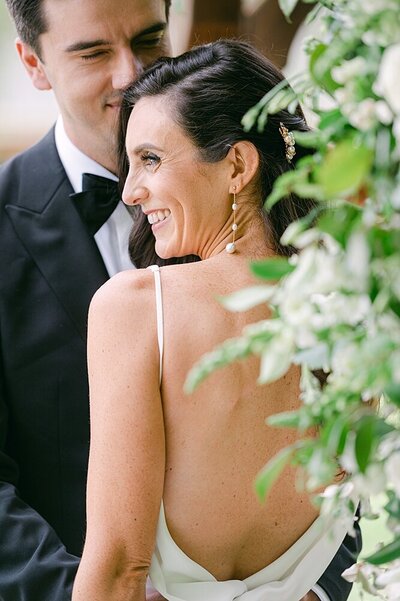 Bride and groom walk up memorial steps at their DC wedding