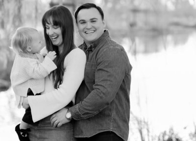 Family laughing during their golden hour shoot in Oak Grove Park, Stockton, California