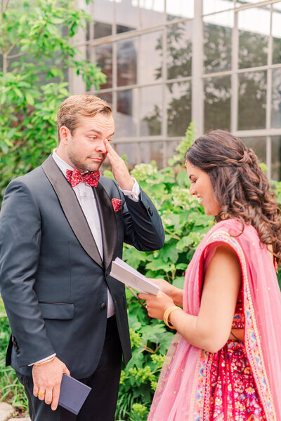 Kentucky bride and groom reading heartfelt vows before the ceremony