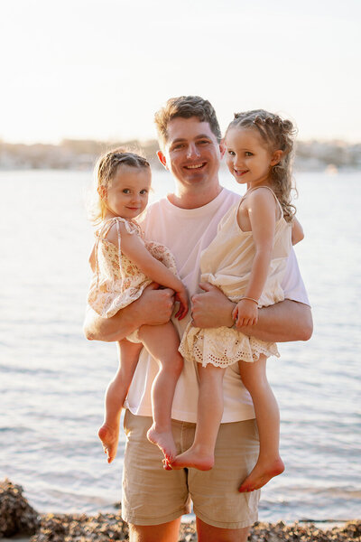 Dad and daughters photo sunset beach