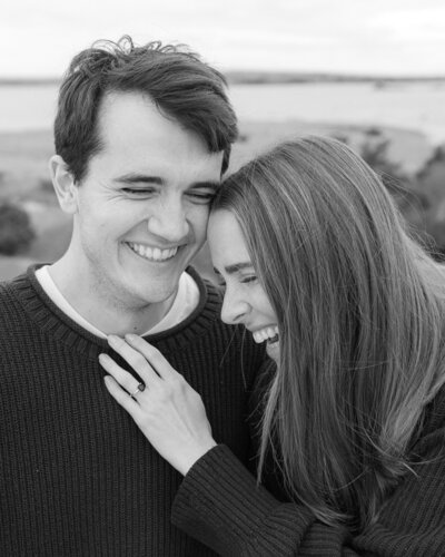 spring engagement photos at watch hill beach in rhode island with dog