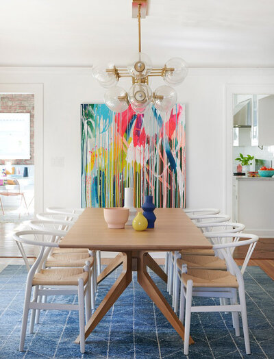 Bright, midcentury modern dining room design by interior designer Dana Triano of Dana Triano Designs