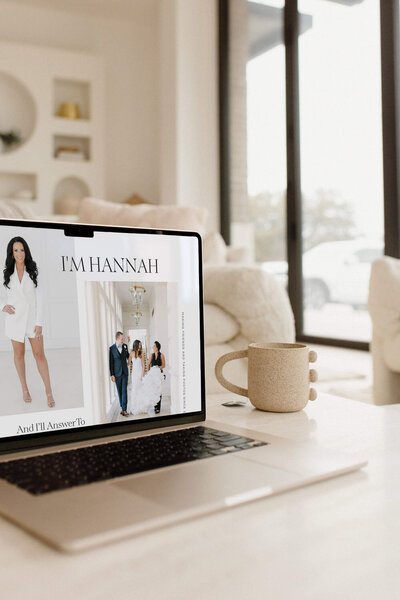 A custom Showit website design for a luxury wedding photographer shown on a laptop