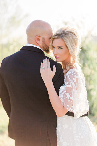 wedding in west virginia couple embracing in field