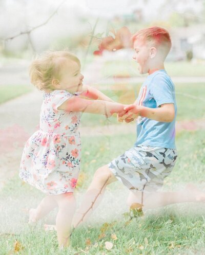 kids swinging in flowers from taking better