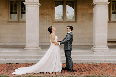 Bride and groom with heads touching while happy