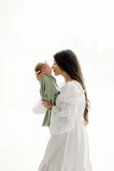 mother holding newborn baby