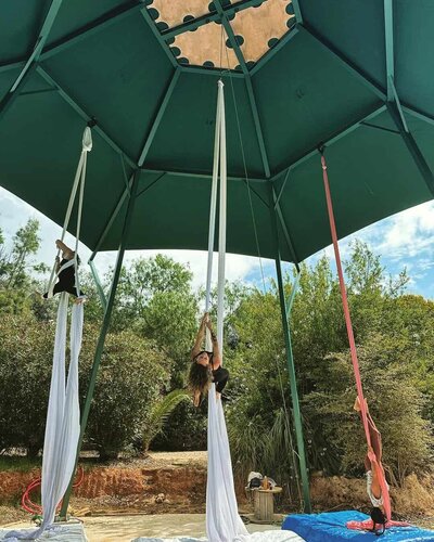 House of Honey Aerial Retreat with 3 aerialists training aerial silks outdoors in Lagos Portugal