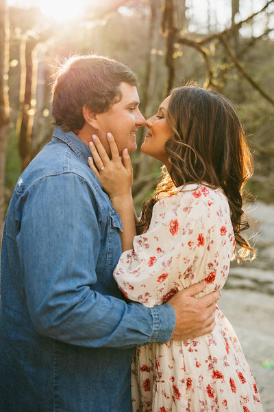 Man and woman during warm, vibrant outdoor engagement session in Nashville