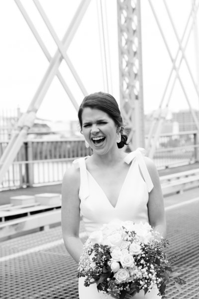 Bride and groom walk up memorial steps at their DC wedding