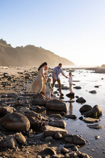 Family exploring at sunset, captured by an Oregon family photographer during a candid session.