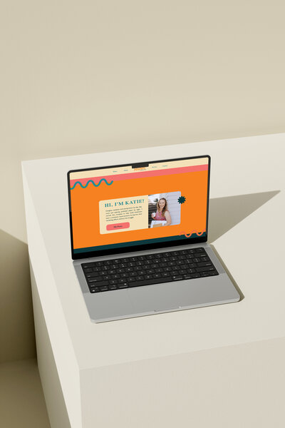 Custom web design and messaging by Ruby Works Co.™ shown on a laptop, featuring vibrant brand colors and friendly, high-converting layout.