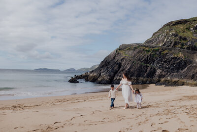 mother-and-daughter-in-dresses-posing-for-photograph