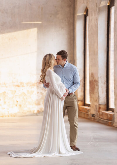Charlotte Maternity Photographer at The Providence Cotton Mill in white maternity gown