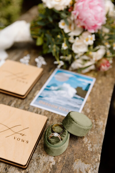 Bride holding up a bouquet of flowers during a beach elopement in Michigan.
