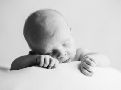 newborn baby sleeping during photo session