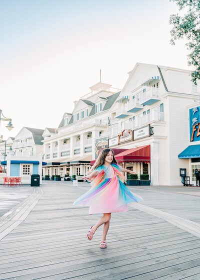 Little girls twirling with rainbow dress at Disney's Boardwalk resort