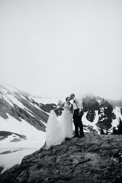 Couple kissing at Mt. Baker