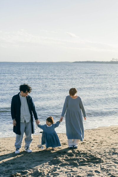 海辺の家族写真