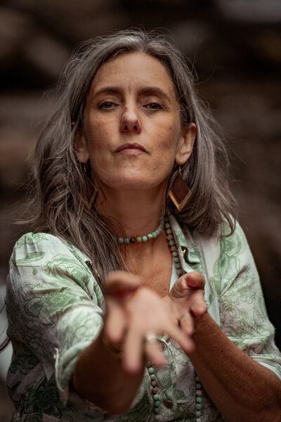 woman reaching out with tenderness