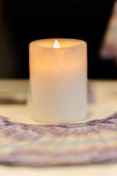 tarot cards with candle