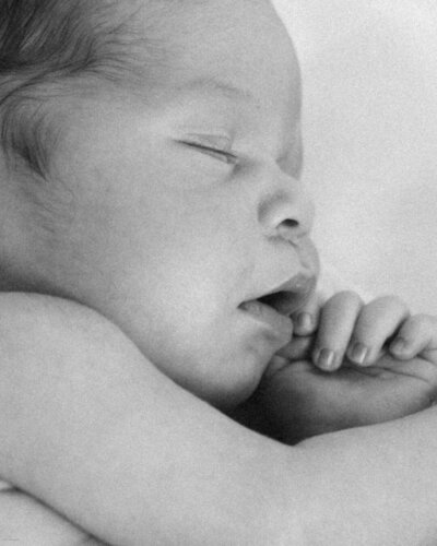 close up of newborn baby sleeping