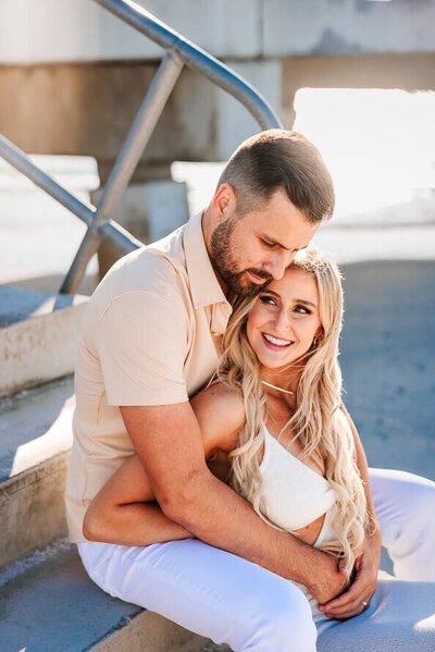 A couple poses on the beach in Clearwater, Florida.