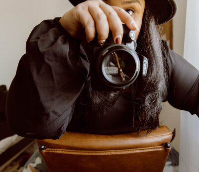 women holding camera