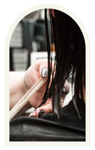 Close-up of precision haircut in progress, showcasing professional salon services at Haven Beauty Collective