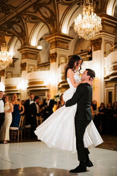 Wedding couple first dance with a lift at the Fairmont Copley in Boston, MA