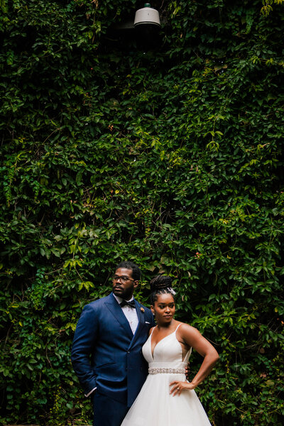 Luxury Wedding Portraits by Moving Mountains Photography in NC - Photo of a couple on their wedding day with green scenery.