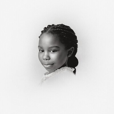 Timeless studio session of girl in children’s portrait photography in Michigan