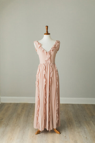 light pink sleeveless dress with ruffles