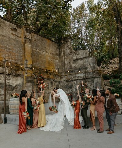 Bridal Party Cheering as Brides Kiss - Megan & Amber | Hood River Wedding  - LGBTQ Wedding