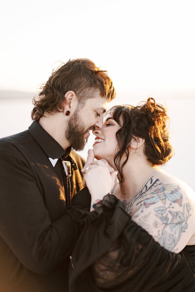 Bride and Groom getting married at La Callie in Salt Lake City Utah with a beautiful strapless wedding dress and black suit. 