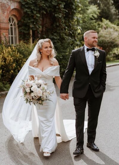 Real Bride Rosh's traditional hollywood wave hairstyle with hair comb accessory and veil at Lainston House