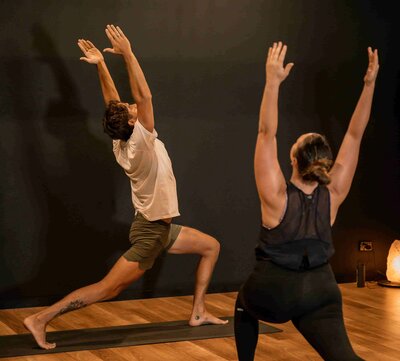 hatha yoga class doing a pose