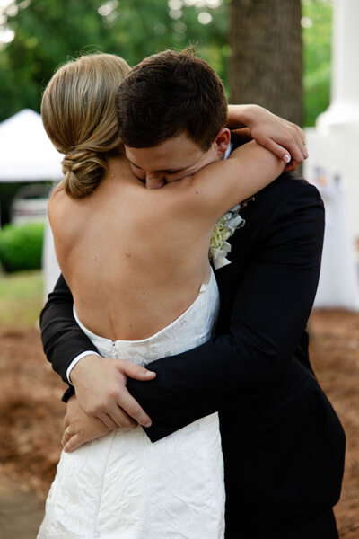 bride and groom hugging atlanta wedding