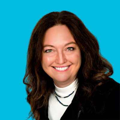 Woman Clinical Program Manager at Move Forward with dark hair in white shirt with black blazer with blue background