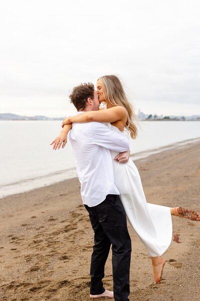 Couple on the beach at Alameda Shoreline 