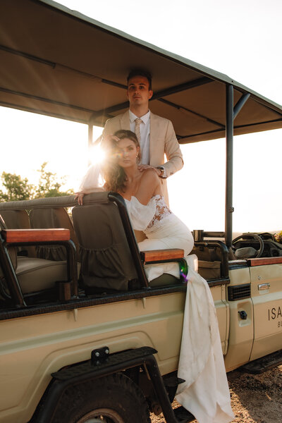 Elopement couple kissing while on a safari retreats